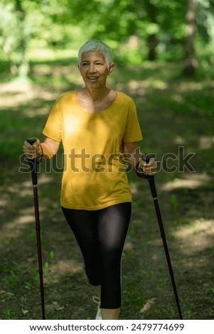 Similar – Active and sporty woman runner in autumn nature