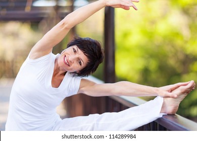 Active Middle Aged Woman Stretching