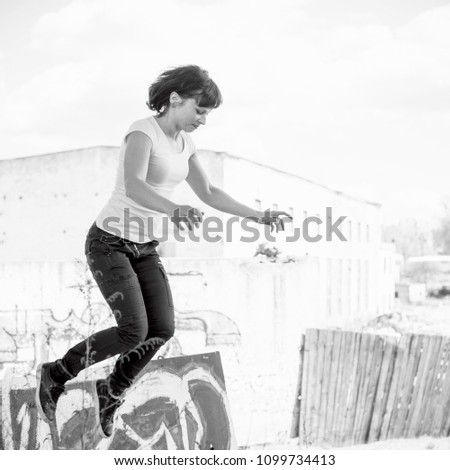 Similar – Beautiful young photographer sitting on the ground with the camera in the country