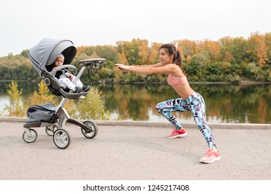 Active Mother Jogging. Jogging Or Power Walking Woman With Pram At Sunset. Mom Squats While Walking With Baby In Stroller