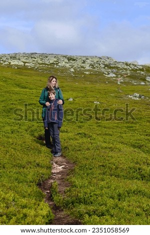 Similar – Foto Bild Junge Frau genießt nordische Landschaft