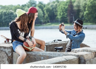 Active People. Two Girls And One Boy Photographed In The Street. Outdoors, Lifestyle