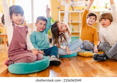 Active preschool Children Interacting with their Teacher. Teacher-child relationships – Early Learning.  Healthy Learning Environment - Shutterstock ID 2156363549