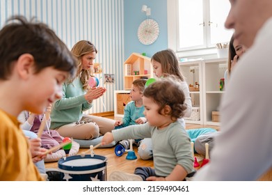 Active Preschool Children Interacting With Their Teacher. Teacher-child Relationships – Early Learning.  Healthy Learning Environment