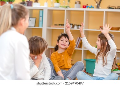 Active Preschool Children Interacting With Their Teacher. Teacher-child Relationships – Early Learning.  Healthy Learning Environment