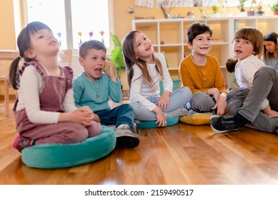 Active Preschool Children Interacting With Their Teacher. Teacher-child Relationships – Early Learning.  Healthy Learning Environment