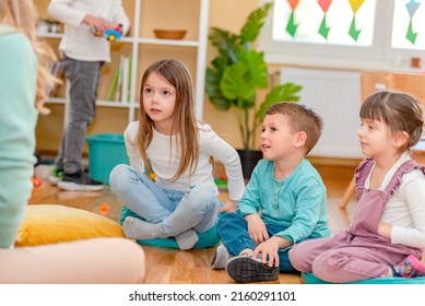 Active Preschool Children Interacting With Their Teacher. Teacher-child Relationships – Early Learning.  Healthy Learning Environment