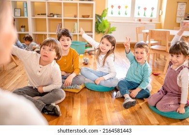 Active preschool Children Interacting with their Teacher. Teacher-child relationships – Early Learning. Healthy Learning Environment
 - Shutterstock ID 2164581443
