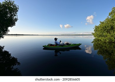 Active Senior Kayaking On Coot Bay In Everglades National Park, Florida On Clear Calm Sunny Winter Afternoon.