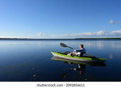 Active Senior Kayaking On Coot Bay In Everglades National Park, Florida On Clear Calm Sunny Winter Afternoon.