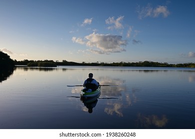 Active Senior Kayaking On Nine Mike Pond In Everglades National Park, Florida.