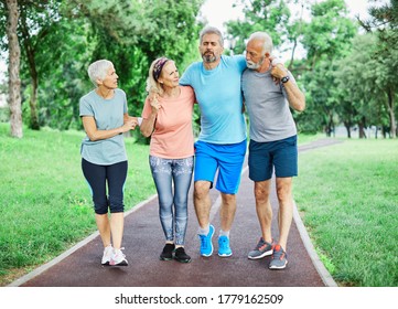 Active senior people jogging together injury problem  in the park - Powered by Shutterstock