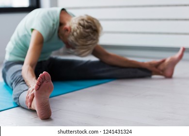 Active Senior Woman Practicing Yoga Indoors. Exercise For Older Adults