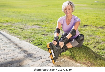 Active Senior Woman Ready To Go Rollerblading On A Sunny Day