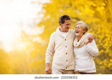 Active Seniors Having Fun And Relax In Nature