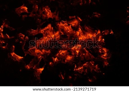 actively smoldering embers of fire