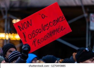 Activists marching for the environment. French sign seen in an ecological protest saying no to planned obsolescence