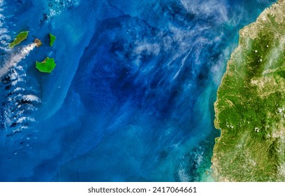 Activity at Krakatau. Ash from the Indonesian volcano streamed over the Sunda Strait. Elements of this image furnished by NASA. - Powered by Shutterstock