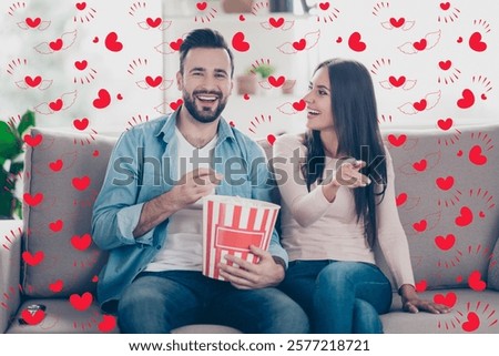 The actor is so amusing comical and laughable Cheerful excited amazed glad delightful beautiful wearing casual outfit they are watching tv and spending time together