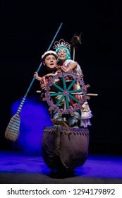 An Actor In A Boy's Costume And An Actress In A Princess Costume Play A Performance For Children On The Theater Stage.