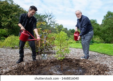 Actor Brian Cox And The Show's Director Dmitry Melkin Water The Tree During The Forest Photo Call At The Edinburgh Fringe Fringe Festival On 02 August 2019