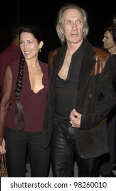 Actor DAVID CARRADINE & Wife At Party At The Pacific Design Center, Los Angeles, To Preview The Latest Products From Hewlett Packard.  30JAN2003.   Paul Smith / Featureflash