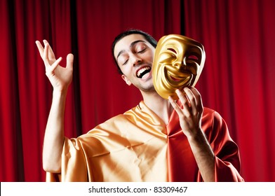 Actor With Maks In A Funny Theater Concept