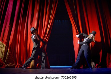 the actor opens a theater curtain - Shutterstock ID 730263595
