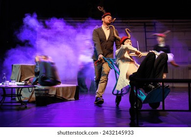 Actors and actresses play a modern performance of the theater stage show - Powered by Shutterstock