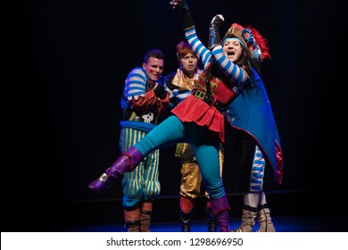 Actors In Pirate Costumes Play A Performance For Children On The Theater Stage