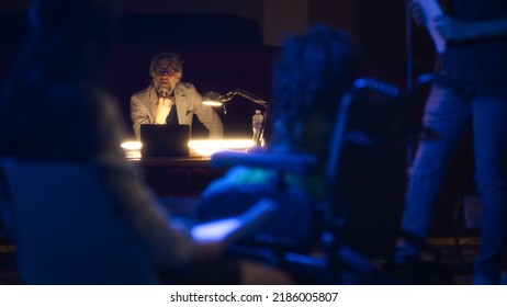 Actress With Disability In Play Rehearsal Emotionally Acting In Wheelchair On Theater Stage With A Group Of Actors And Director