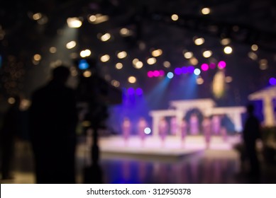 Actress Or Singer In Studio Of Television Station With Camera And Cameraman