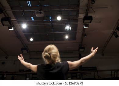 actress singing and acting in theater play - Powered by Shutterstock