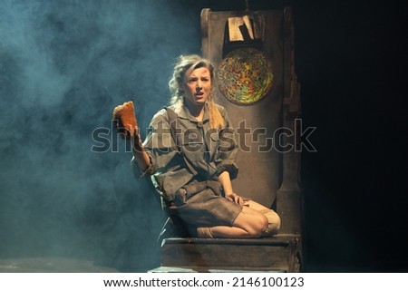 Actress woman play role old costume a performance on stage in the theater