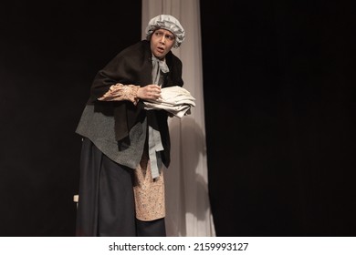 Actress Women In Retro Dresses With Long Skirts Play On Stage Theater