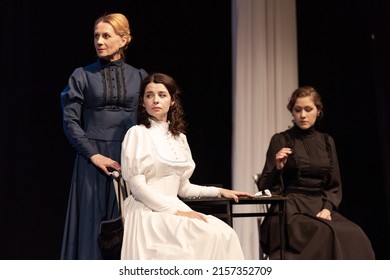 Actress Women In Vintage Black Dresses With Long Skirts Play On Stage Theater