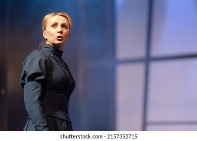 Actress Women In Vintage Black Dresses With Long Skirts Play On Stage Theater