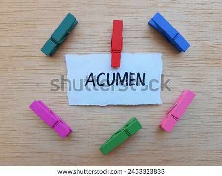 Acumen writting on table background.