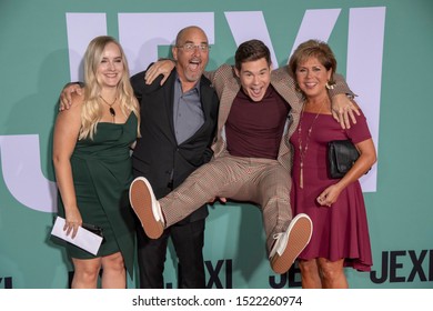 Adam Devine With Family Attends 