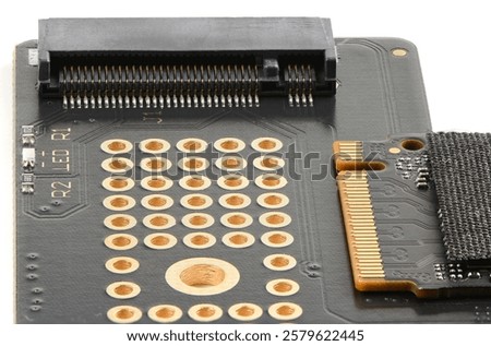 Adapter board for M2 SSD disk for high speed data storage close-up on white isolated background, shows elegant design.