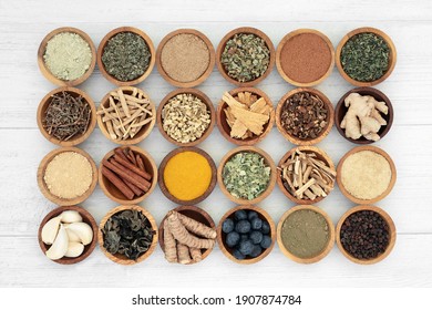 Adaptogen healthy food with herbs, spices, fruit and supplement powders. Natural plant based foods that help the body deal with stress and  promote or restore normal physiological functions.   - Shutterstock ID 1907874784