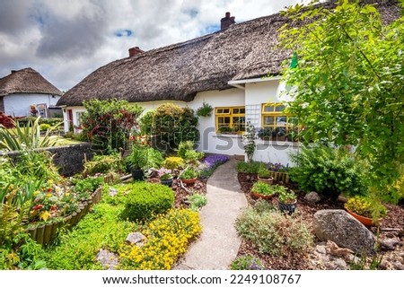 Adare village Historic site with traditional thatched roof cottages