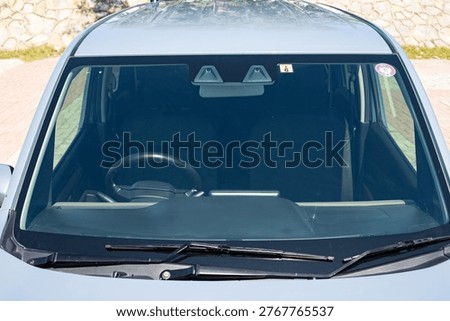 ADAS Car Safety Sensor Mounted in Front Windshield of a Car