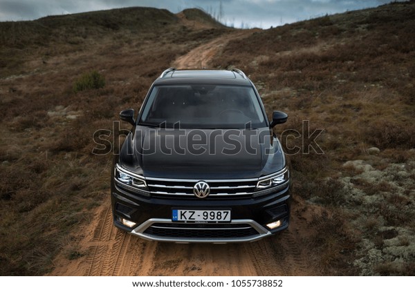Adazi, LV - NOV 25, 2017: Volkswagen Tiguan
Allspace on the descent from the
hill