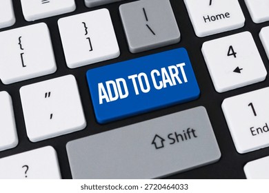 Add to cart button on computer keyboard. Concept of online shopping, e-commerce business and digital retail.