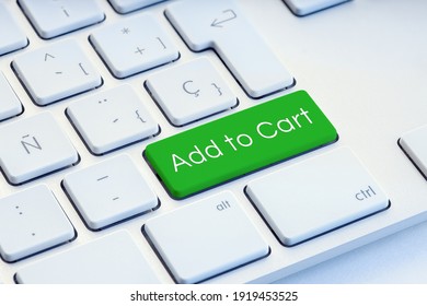 Add to cart on green computer Keyboard Key