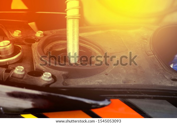 Add motorcycle oil to
the petrol pump.