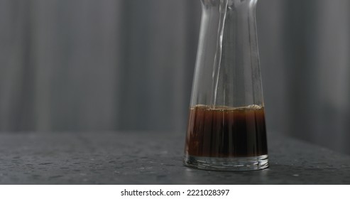 Add Water Into Coffee In Glass Carafe