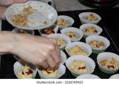 Adding Crushed Nuts To Muffins. Homemade Cakes.