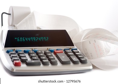 An Adding Machine Or Calculator With Adding Machine Tape Or Paper.